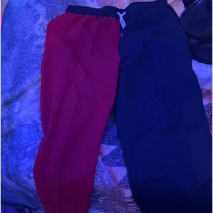 Black, red, and white mens sweat pants.